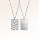 Personalized square silver necklace with rippled wave surface and space for engraving of text, coordinates or handwriting on the back