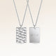 Personalized square silver necklace with rippled wave surface and space for engraving of text, coordinates or handwriting on the back