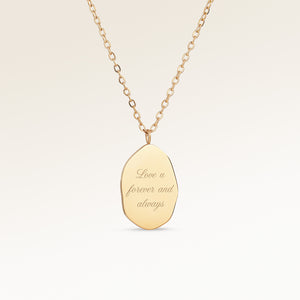Personalized asymmetric gold necklace with space for engraving of text, coordinates or handwriting on the front and back