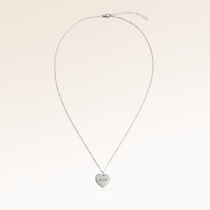 Full heart-shaped necklace in silver fully laid out with fine adjustable silver chain and minimalist heart pendant for personalized engraving