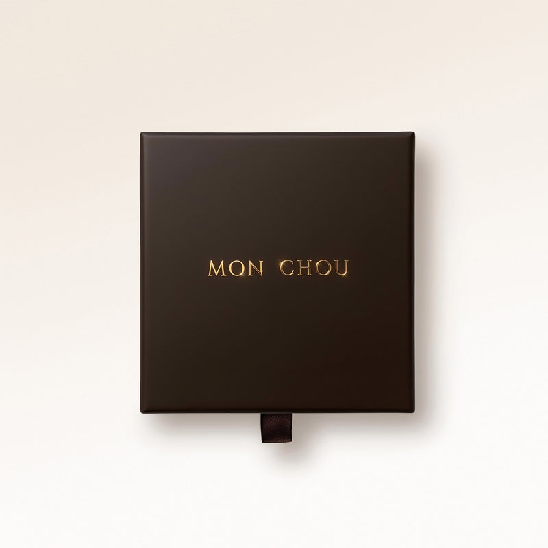 Mon Chou exclusive gift box in dark brown with gold logo, free gift wrapping for personalized necklaces and bracelets with engraving.