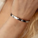 Friendship bracelets, pair of two bangle bracelets in gold and silver with personalized engraving, from Mon Chou