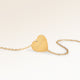 Heart-shaped gold necklace without engraving with smooth surface, ready for personalized engraving on back
