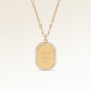 Personalized octagonal gold necklace with white zircons along the edge and space for engraving of 8 characters on one line on the front